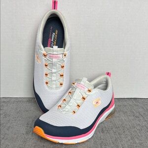 Skechers White Slip on Sneakers with Pink Orange Accents
